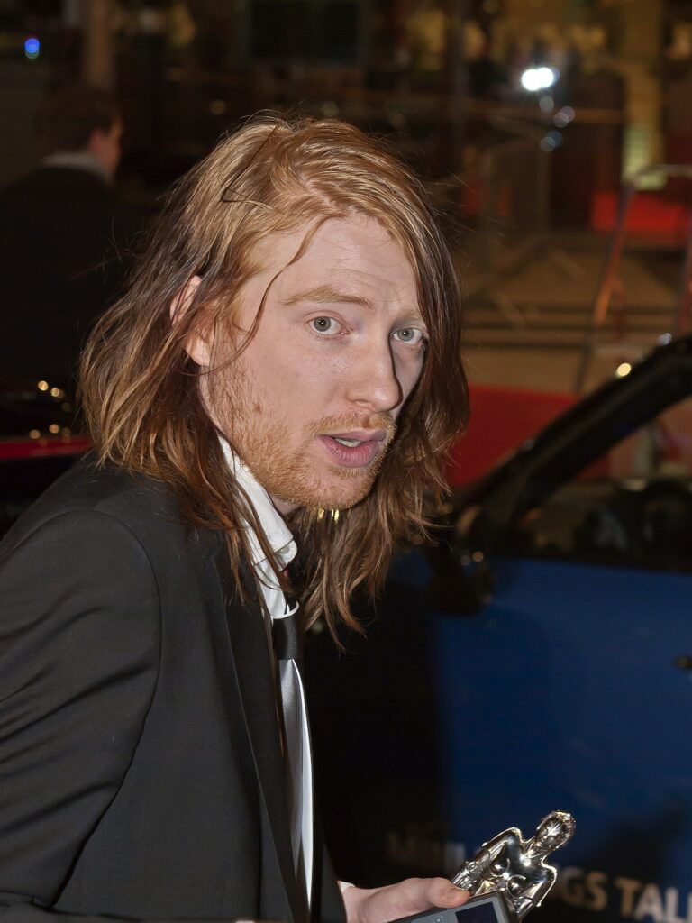 Where to Watch Taylor Swift’s "Opalite" Music Video: Everything We Know About the Domhnall Gleeson and Greta Lee Collaboration 3 1000054434